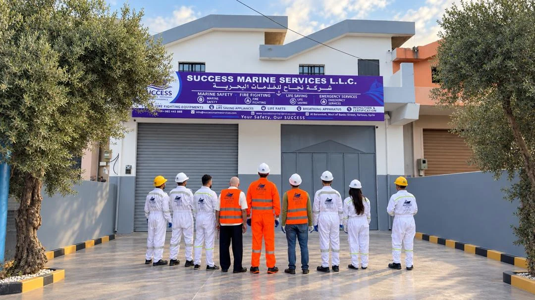 Service team outside the station